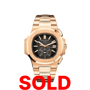 A gold watch with the words " sold ".