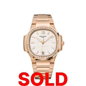 A patek philippe watch with the word sold in front of it.