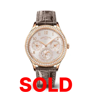 A rose gold watch with diamonds on the face.