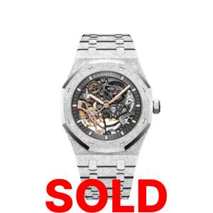 A silver watch with the words " sold ".