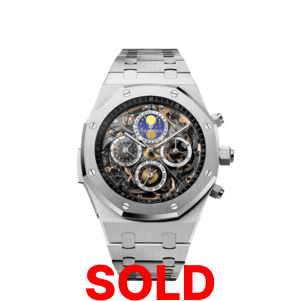A silver watch with the words " sold ".