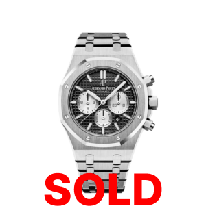 A silver watch with the words " sold ".
