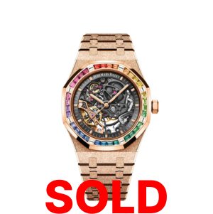 A gold watch with the words " sold ".