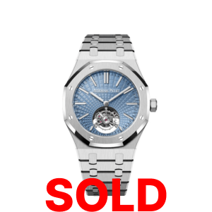 A silver watch with the words " sold ".