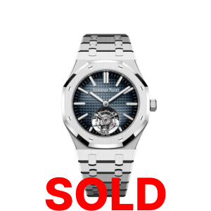 A silver watch with the words " sold ".
